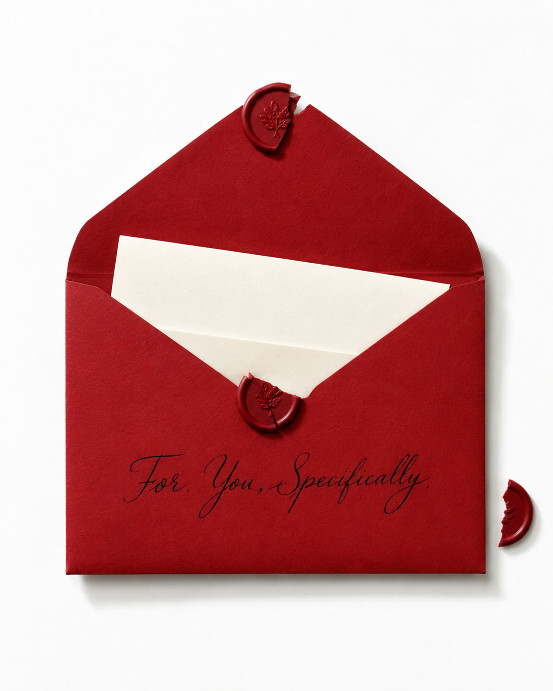 An opened red envelope with a card inside